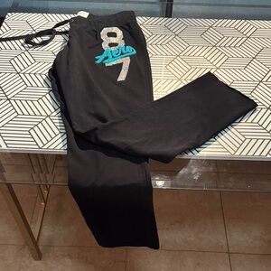 Black Sweatpants with Teal and Glitter Logo